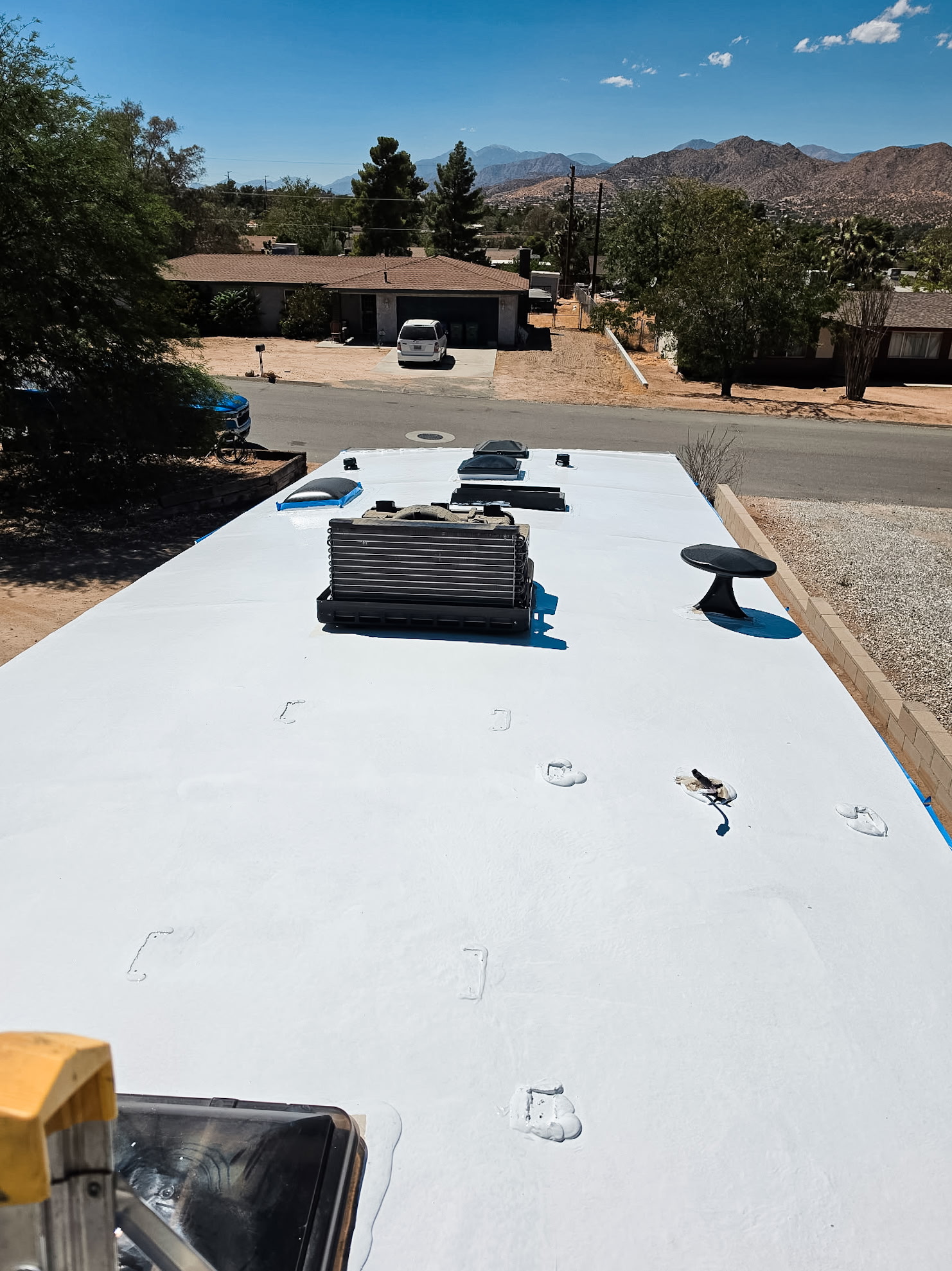 Freshly coated white RV roof in the high desert