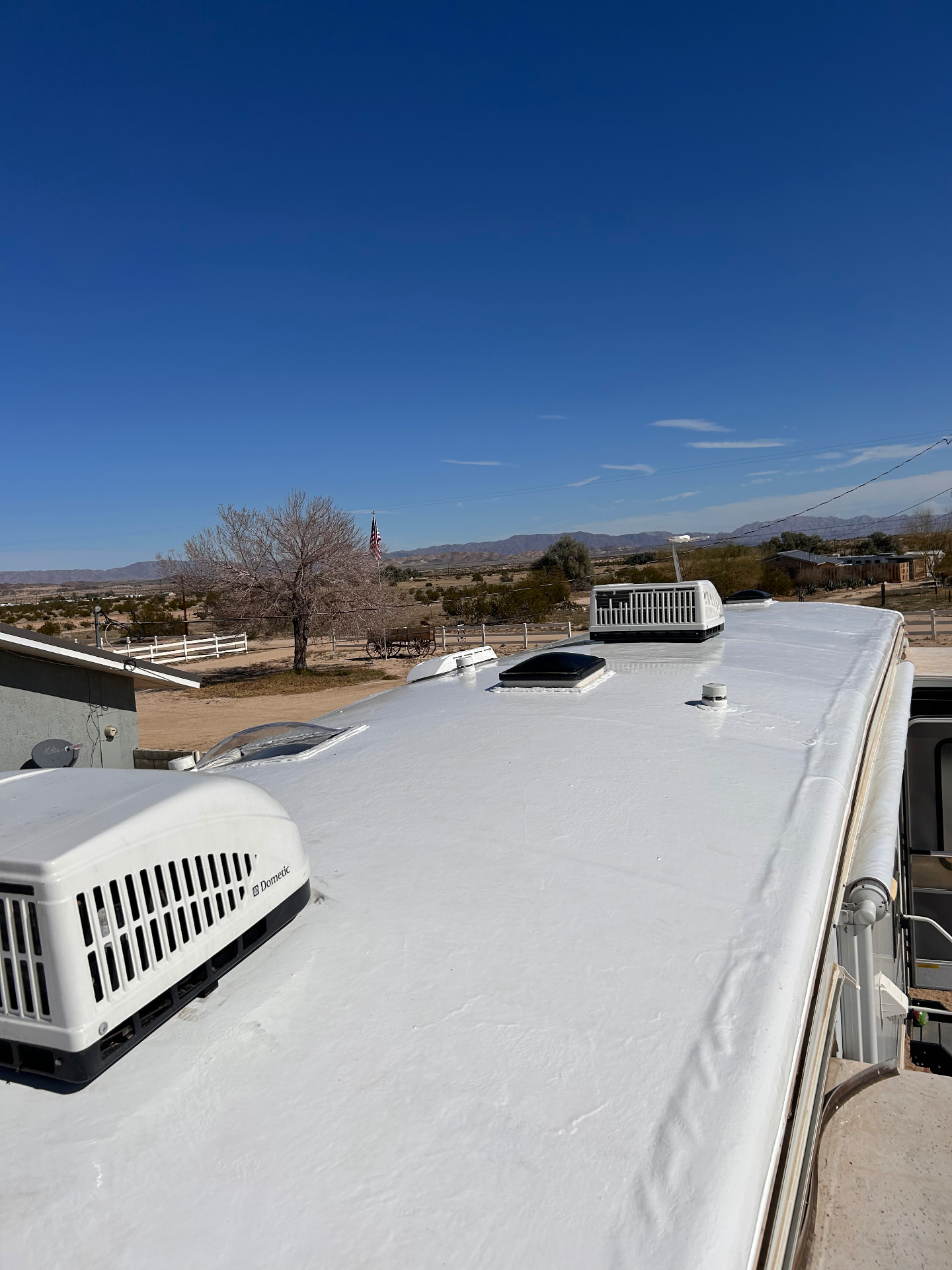 Air conditioning units on a coated RV roof