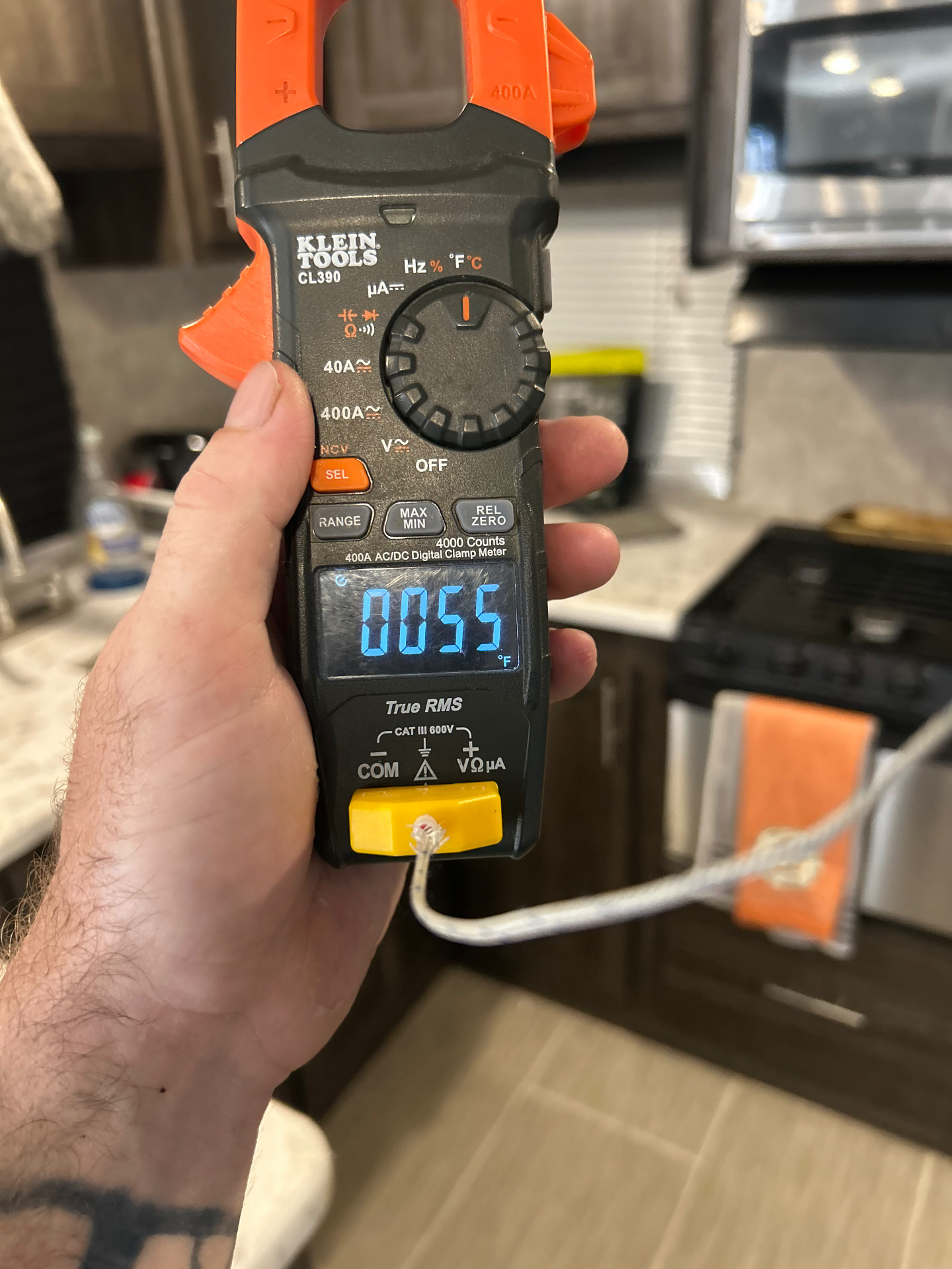 Digital meter being used to check an RV electrical system